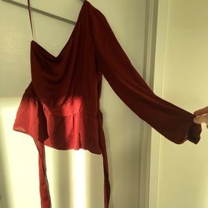 One shoulder deep red peplum top